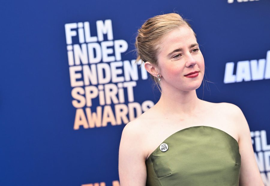 Taylor Dearden on the red carpet at the 2026 Film Independent Spirit Awards wearing a green strapless gown